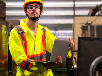 Morley Moss technician providing Building Operations Services at a client facility's